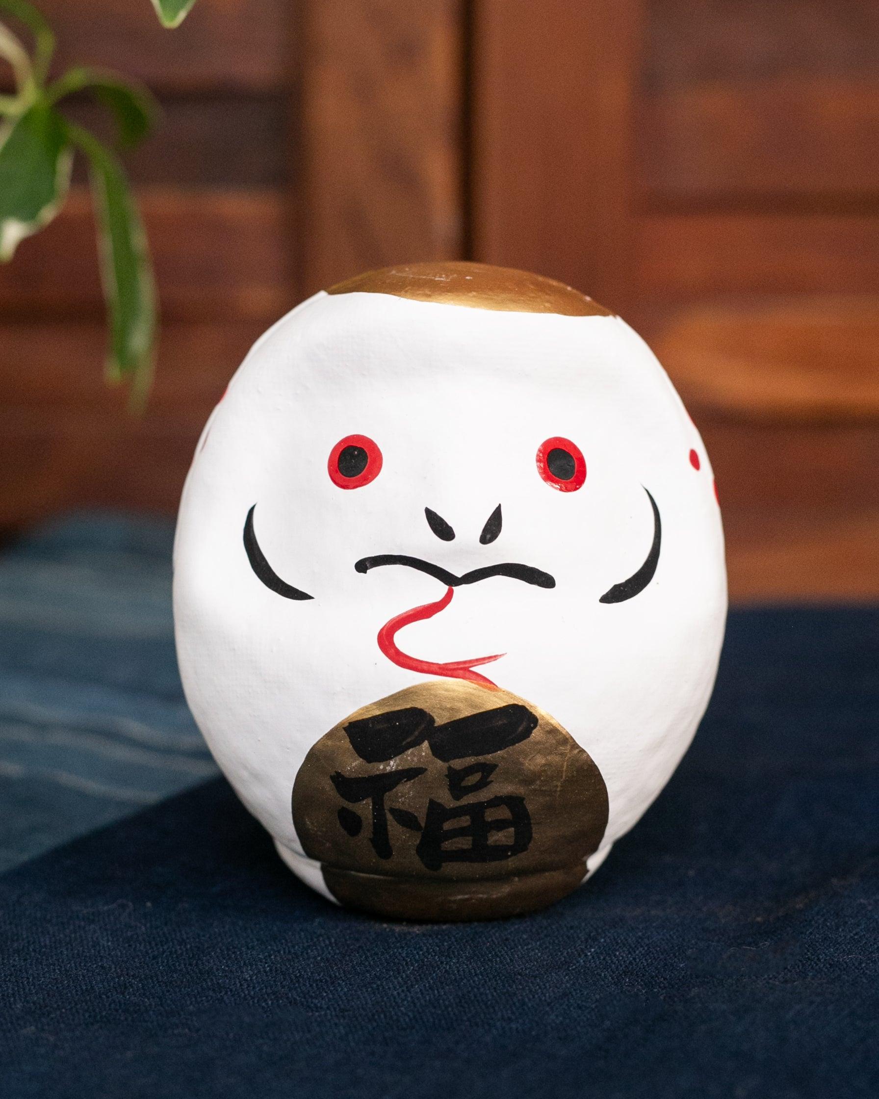 Daruma, Snake
