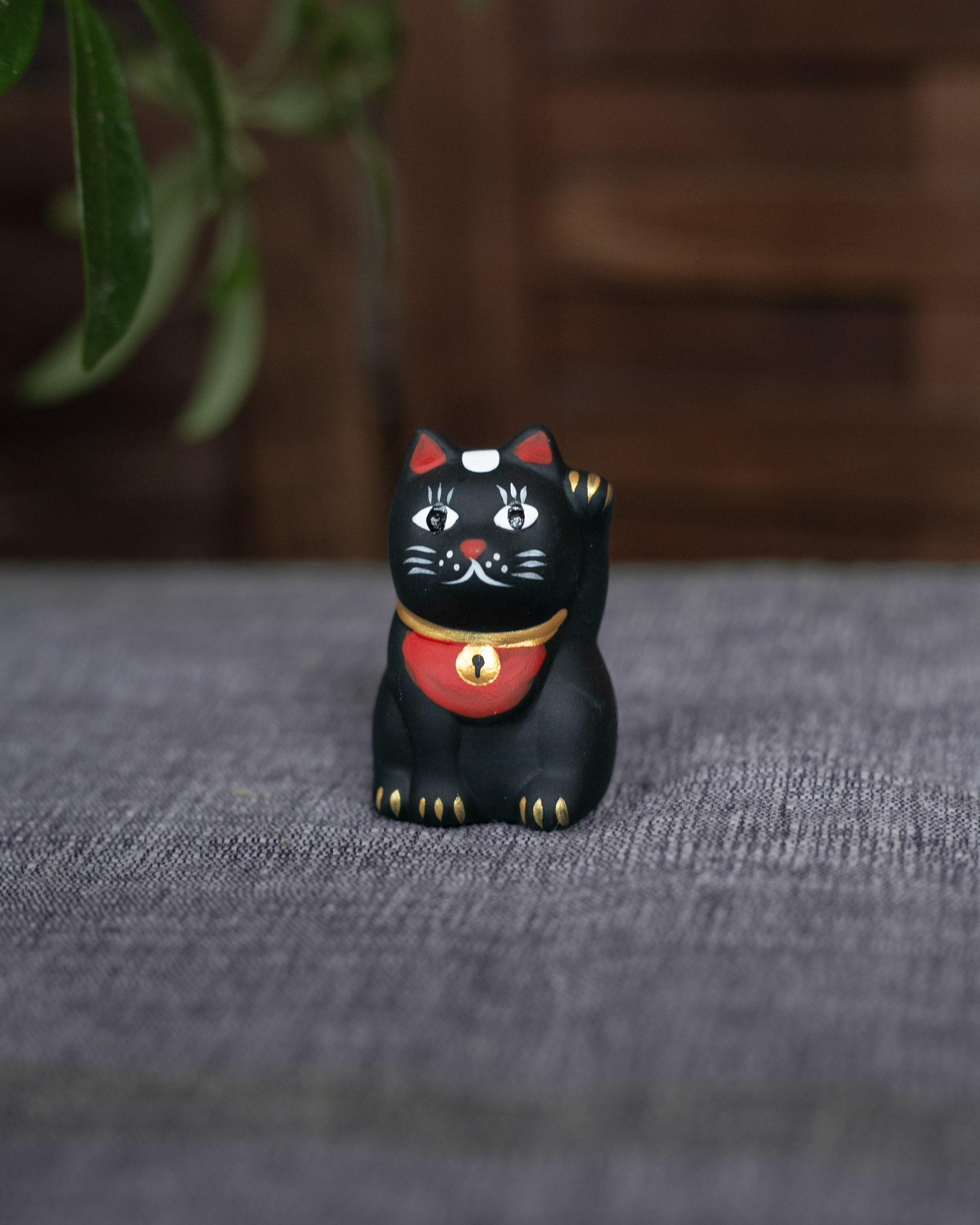 Omikuji Maneki Neko, Black
